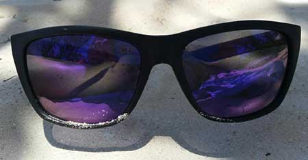 Rheos Gear Sapelos with gunmetal frame and purple lenses