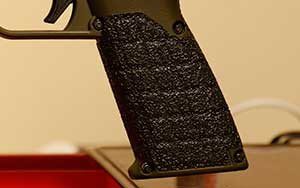 Closeup of KSG grip, after the installation of Tractiongrips