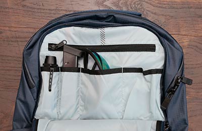 Flashlight, spare magazine, and "Daylight vision goggles" (sunglasses) in the SOG Surrept 24 CS Daypack