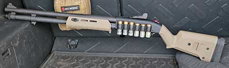  Mossberg 590 12 gauge shotgun with Magpul MOE Forend and SGA Stock 