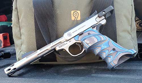 S&W SW22 Victory looks like a whole different pistol with the Volquartsen I-Fluted stainless steel match barrel and their laminated grips