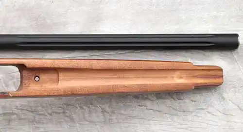 The 10/22 factory stock needs to be modified for the .870" barrel.
