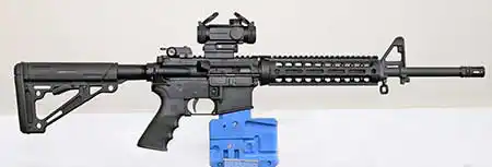 Midwest Industries two-piece drop-in AR Handguard and 3.5 lb single-stage trigger installed. 