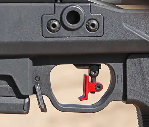 Magpul Pro 700 Folding Rifle Chassis magazine release and grip adjustment hash marks. 