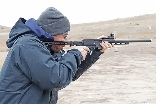 Viridian RFX25 Green Dot Reflex Sight mounted on a rimfire rifle. 