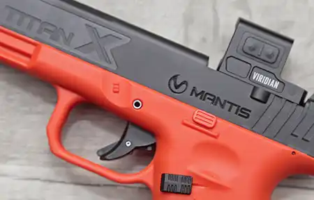 My own optic installed on the Mantis TitanX. Magazine release is reversible too. 