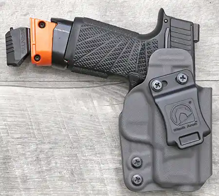 DryFireMag in a holstered Sig P365 with Mantis X10 installed. 