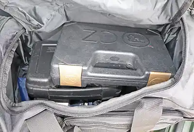 Pistol cases in the Highland Tactical ELITE Tactical Duffel Bag.