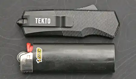 Tekto A5 Spry Mini automatic knife with Bic lighter for size comparison