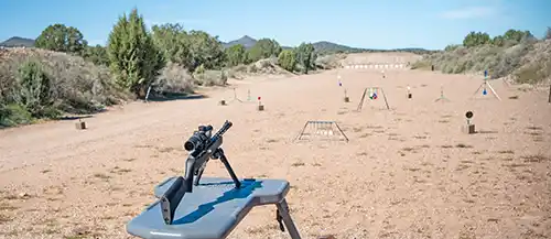 TandemKross TKX22 Light Rifle with scope and bipod aimed downrange at steel targets at Gunsite.