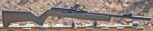 Side profile of a TandemKross TKX22 Light Rifle with a Trijicon optic mounted on the top rail.
