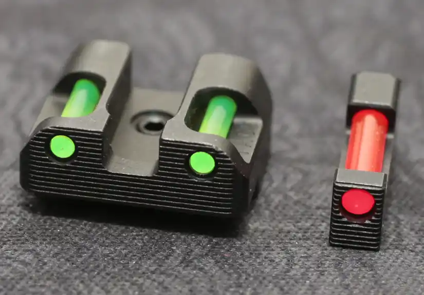 Rear view of TAG Precision Glock sights showing green fiber optic rear inserts