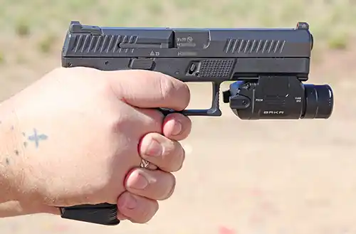 COAST PTX35R pistol light controls reached from a firing grip