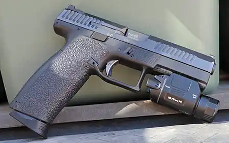 COAST PTX35R rechargeable pistol light mounted on a CZ P10 F
