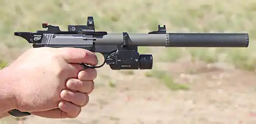 COAST PTX35R mounted on a suppressed Browning Buck Mark pistol