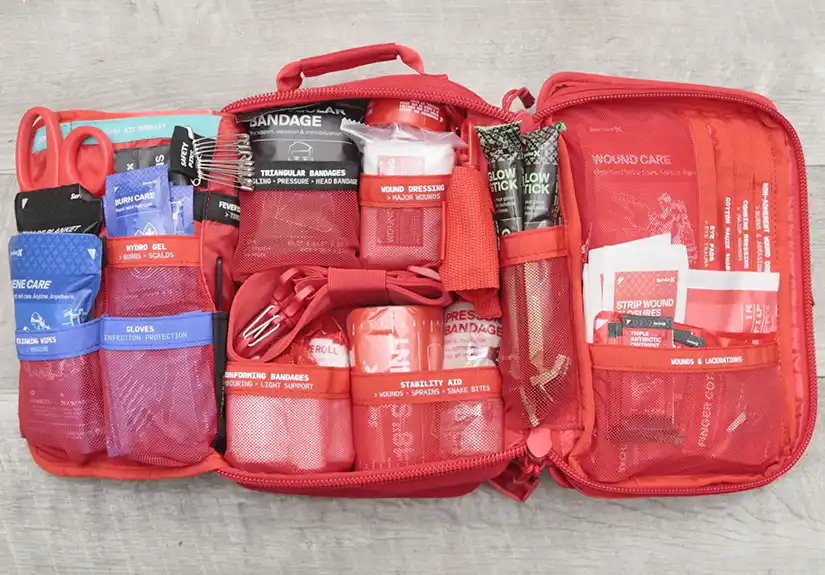 SurviveX Large First Aid Kit opened to show organized first aid supplies