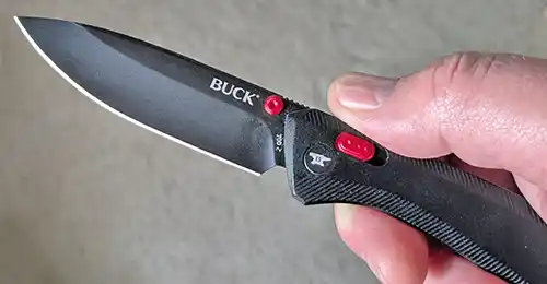  Buck 700 Nomad open in hand