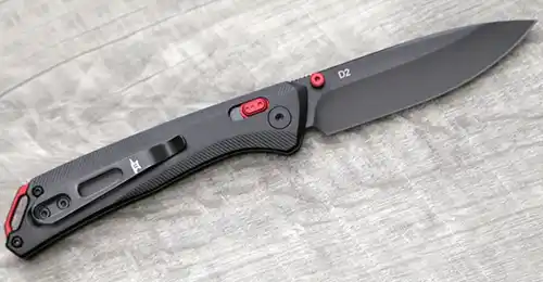 Buck 700 Nomad open showing D2 drop-point blade and pocket clip