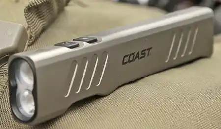 Coast Slayer dual-lens flashlight with angled cuts and firearms-inspired styling