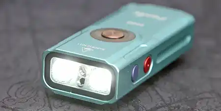 Fenix E06R white light output shown from the front of the flashlight