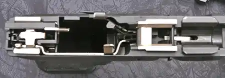 Metal internal components used in a Glock-pattern pistol frame