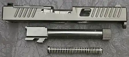 Metal slide, barrel, and recoil assembly for a Glock-pattern pistol