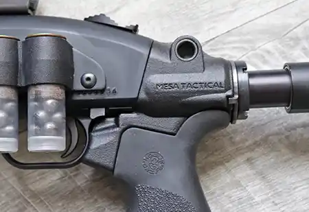 Left side of the Mesa Tactical LEO Gen II Telescoping Stock Adapter installed on a Mossberg 590