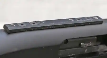 Mounting cleat for the Mesa Tactical SureShell Carrier and Rail on a Mossberg Shockwave