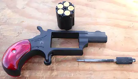 NAA Mini-Revolver with cylinder and cylinder pin removed for loading