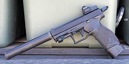 Original full-size Taurus TX22 with suppressor and red dot