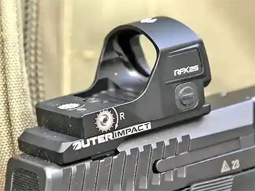 Viridian RFX25 green dot reflex sight mounted on an optics plate