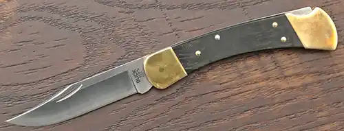 Buck 110 Slim Heritage Elite open showing MagnaCut clip-point blade